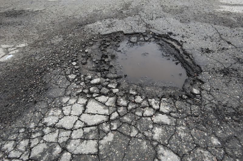 How Weather Conditions Affect Asphalt Cracks And Potholes